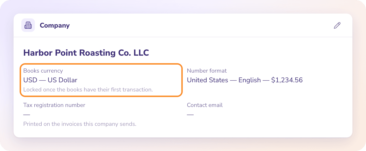 Company settings: the books currency, USD, locked once the books have their first transaction